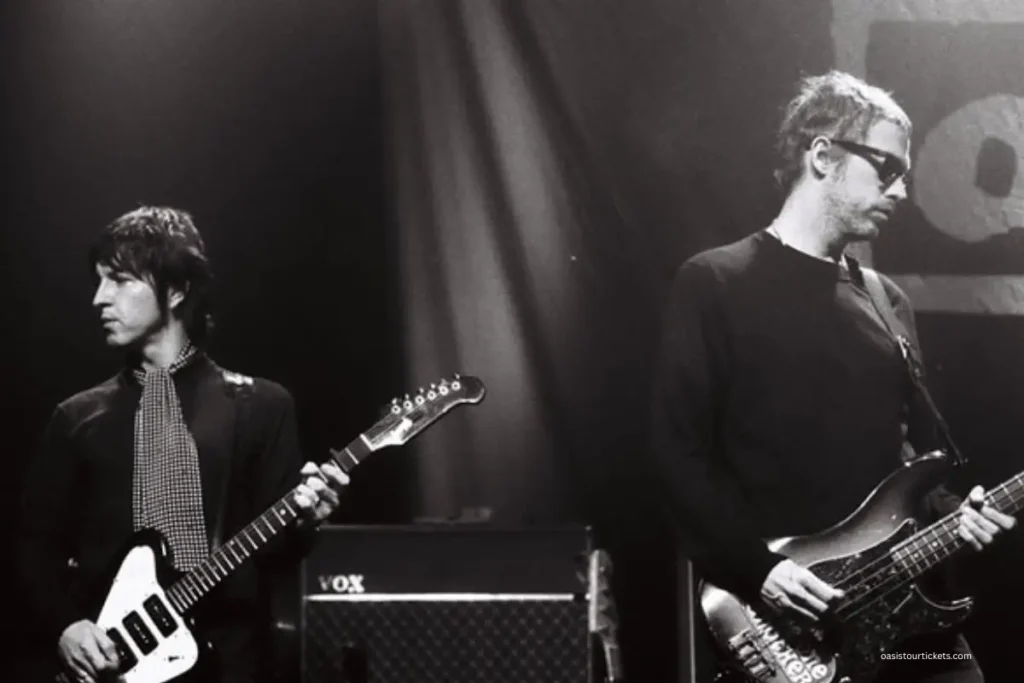Oasis Live performance. Gem Archer & Andy Bell 
