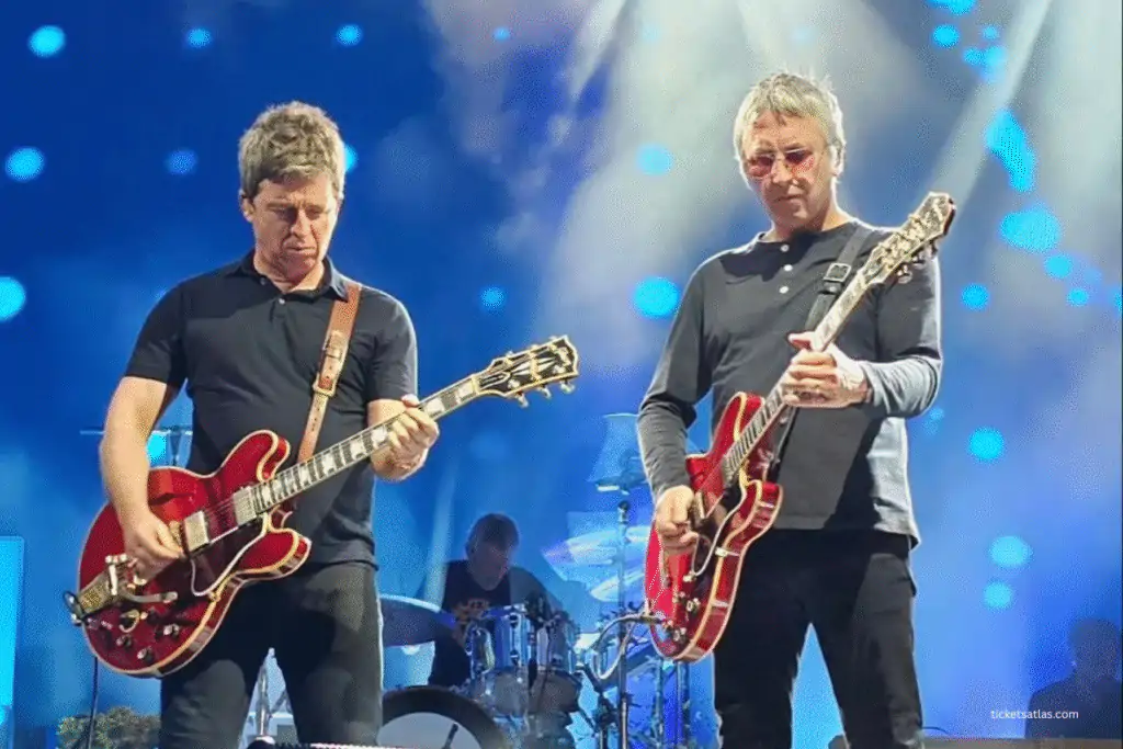 Gem Archer with Noel Gallagher live on stage