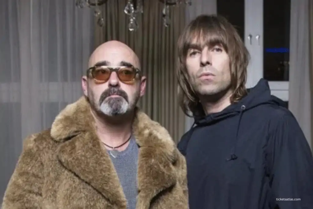 Paul “Bonehead” Arthurs with Liam Gallagher