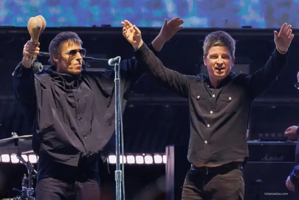 Liam and Noel Gallagher on stage for Oasis Tour